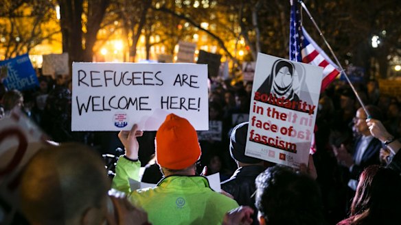 Protesters demonstrate against Trump's revised travel ban outside the White House in March.