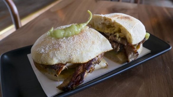 Juicy mouthful: The Cuban sandwich.