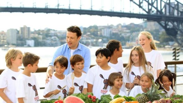 Jamie Oliver appears at the Opera House for a media call with a troop of kids to promote fresh healthy food for children.