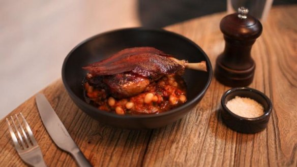 Slow-cooked duck leg with white bean cassoulet.