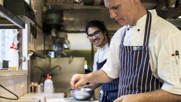 Chef Cameron Johnston prepares a dish at St Claude's.