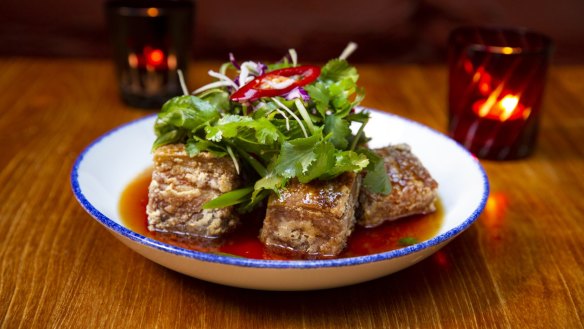 Red Spice Road's signature pork belly dish is coming to its new home.