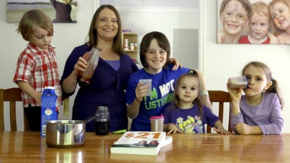 Fiona Lippey, with Tristan, 4, Sam, 10, Elora, 2, and Jacqui, 8, has written 'The $21 Challenge' and runs the simplesavings.com.au.