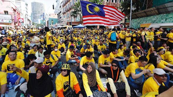 Protesters occupy a street in downtown Kuala Lumpur to demand electoral reform and Najib Razak's resignation.