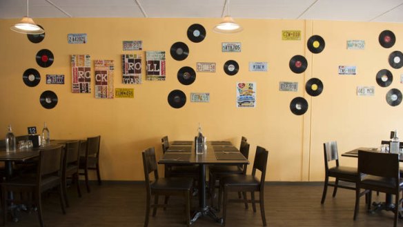 Rockin Ribs restaurant is decorated with records and also features a jukebox.