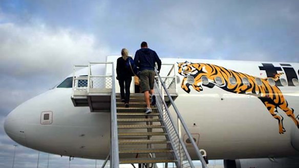 Put up to check in ... Tiger Airways will charge $10 to passengers who want to check in at the airport, rather than online.