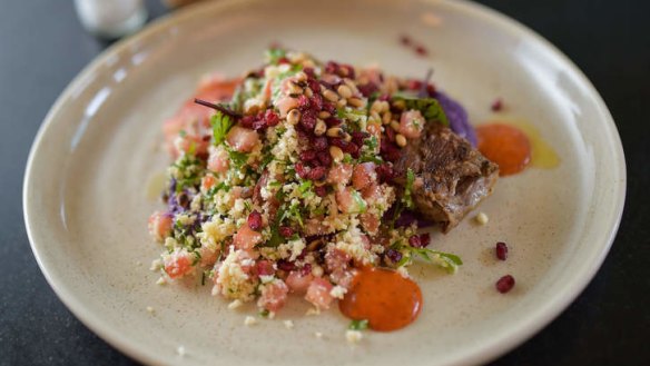 Pressed lamb shoulder, purple cabbage, cauliflower tabbouleh, barberries, pine nuts and harissa.