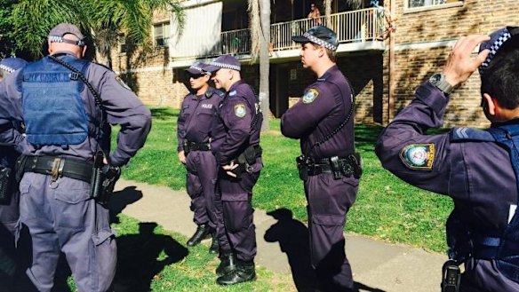 Police raid the Wentworthville unit.
