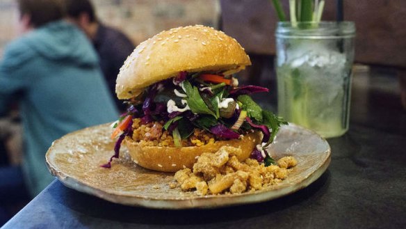 Nam khao tod sandwich, with pork and rice cake.