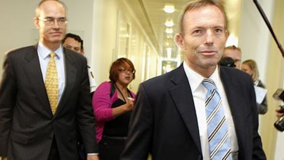 Tony Abbott heads back to his office after defeating Malcolm Turnbull by one vote.