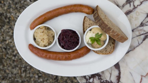 Just-right lunch: The debrecziner includes two pork sausages, pickled cabbage, sauerkraut, mustard and bread.