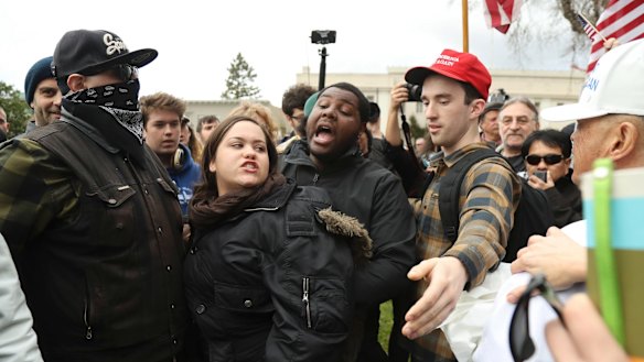 Antifa members protest in Berkeley California.