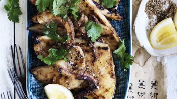 Miso-glazed squid stakes are best washed down with sake.