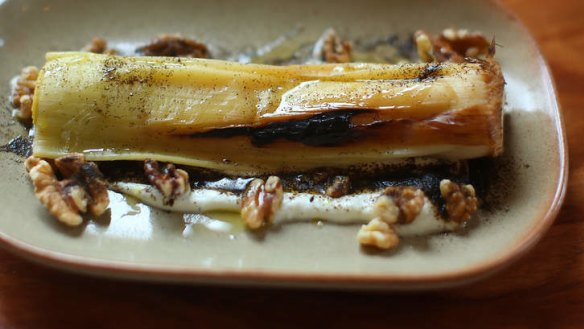 Roasted split leek on a bed of silky goat's curd.