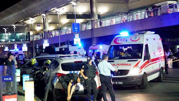 Turkish security officers and ambulances gather outside Istanbul Ataturk Airport.