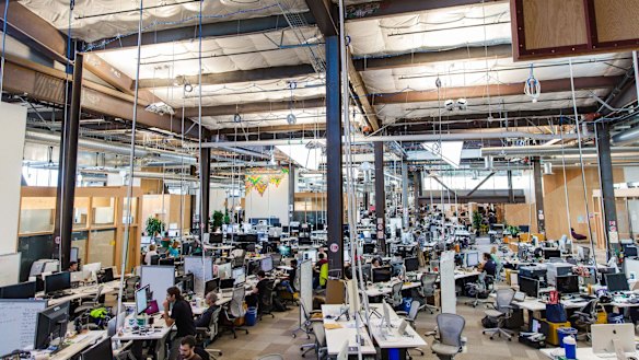 Employees inside Facebook's Menlo Park, California, office, which may be the longest continuous work space in the world.