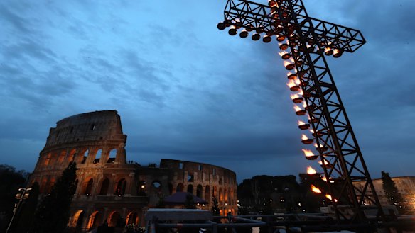 A view of the cross, lit ahead of Pope Francis arrival for the Via Crucis (Way of the Cross) torchlight procession on Good Friday. (AP Photo)