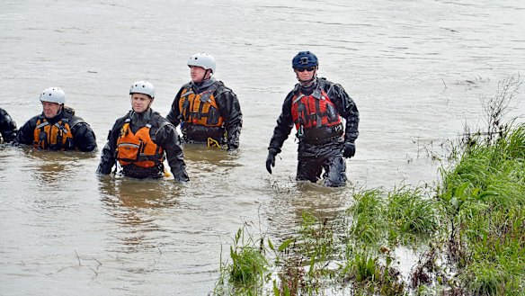 Searchers scour the Dandenong Creek to find a missing three-year-old boy