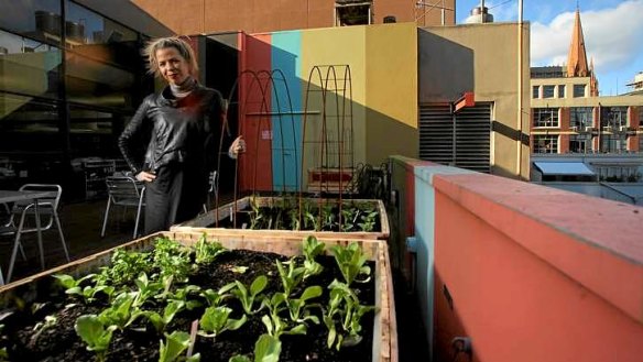Architect Rebecca Daff at the rooftop veggie garden of her firm.