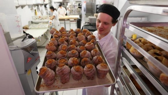 Ry Stephen with a finished tray of cruffins at his San Francisco bakery Mr Holmes Bakehouse.