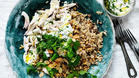 Feast on this: Fragrant poached chicken with spicy, nutty rice.