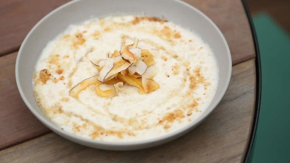 Coconut porridge with caramelised bananas, macadamia and palm sugar.