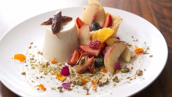 Goat's milk and date panna cotta with seasonal fruit, kataifi pastry and pistachios.