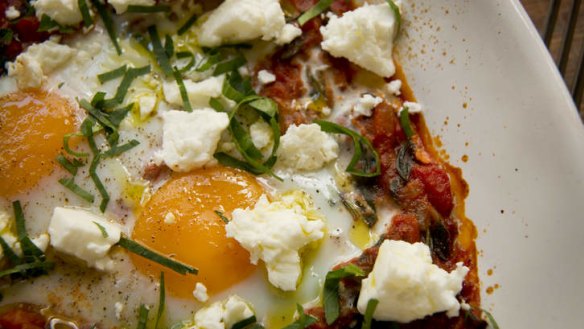 Frank Camorra's baked eggs with spicy tomato and fetta.