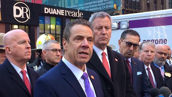 New York Governor Andrew Cuomo in the foreground.