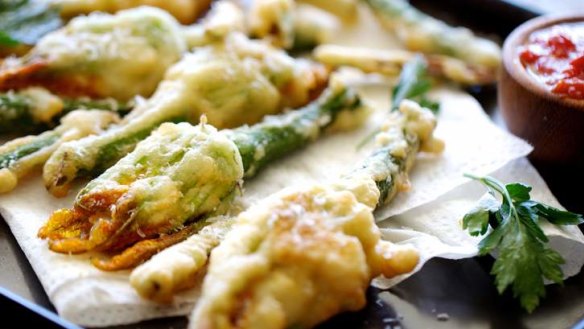 Burst of sunshine: Zucchini flowers with mozzarella and anchovy.