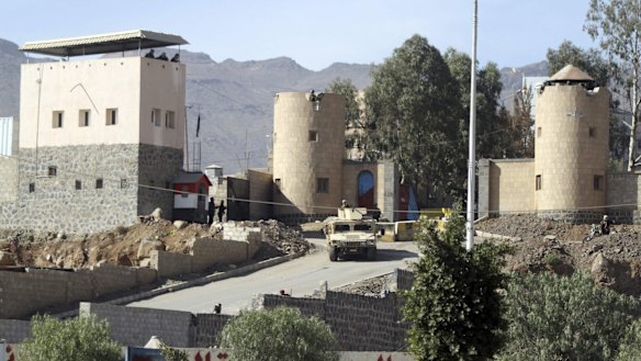 A vehicle from the Presidential Protection Forces is seen positioned outside the house of President Hadi