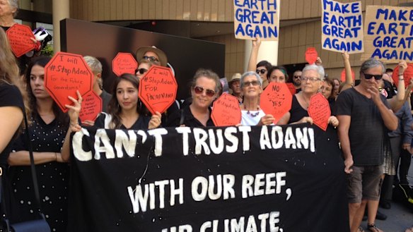 Protesters gathered as Adani's local mining chief executive Jeyakumar Janakaraj spoke at a business lunch in Brisbane.