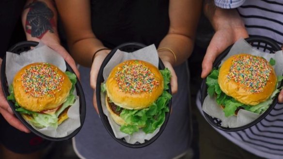 Mary's burgers turn rainbow for Mardi Gras.