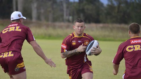 Coming through … Todd Carney hits the ball up during Country's practice session at Mudgee yesterday. The Cronulla five-eighth will team up with Newcastle's Jarrod Mullen in the halves.