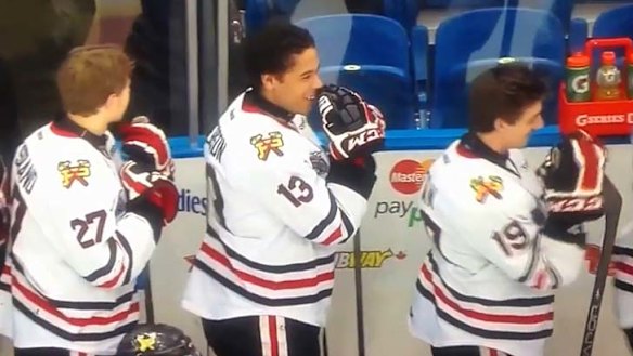 Players chuckle as Alexis Normand makes a mistake.