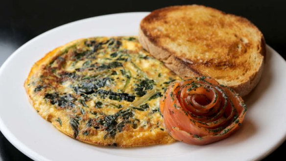 Collards omelette with smoked salmon rosette.