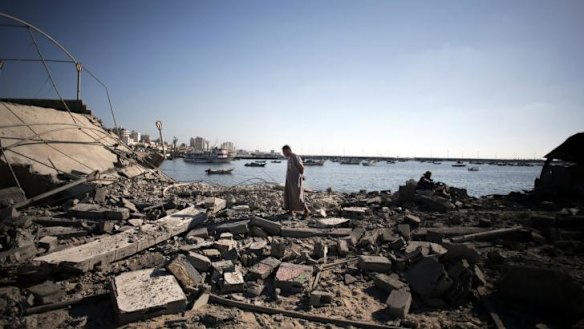 The damage after the blasts on the beach.
