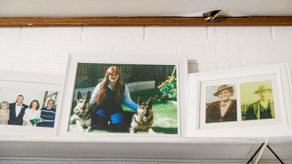 A hole in the ceiling at Dawn Elms' residence leaks water every time it rains, damaging her family photos. It has been there for a decade.