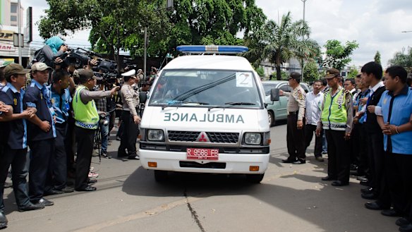 Ambulances carrying the bodies of Myuran Sukumaran and Andrew Chan arrive at the Abadi Funeral Homes in Daan Mogot, West Jakarta.