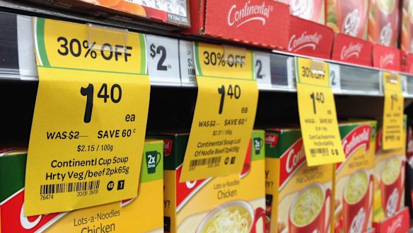 Analysts have slashed profit forecasts for Coles, saying recent price cuts could  trigger an aggressive response from Woolworths and increase the risk of a full- blown price war. 