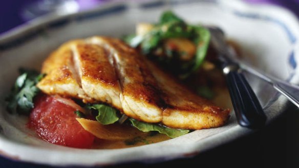 Baked barramundi fillets with tomato, ginger and coriander