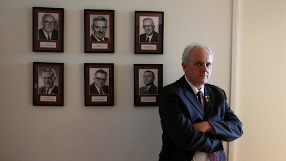 Democratic Labour Party MP no more: Senator John Madigan with portraits of former DLP politicians in his office after announcing he was quitting the party and will continue his term as an independent.