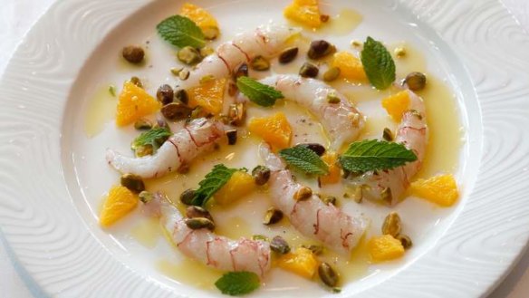 Scampi crudo with orange, mint and pistachio.