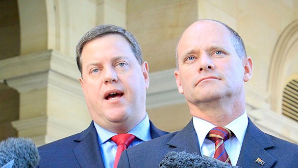 Cutting public service jobs for the good of the state's coffers 'is not a task we relish', Tim Nicholls, pictured with Campbell Newman, says.