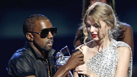 Kanye West invades the stage and snatches the microphone from best female video winner Taylor Swift to praise Beyonce during the MTV Video Music Awards.