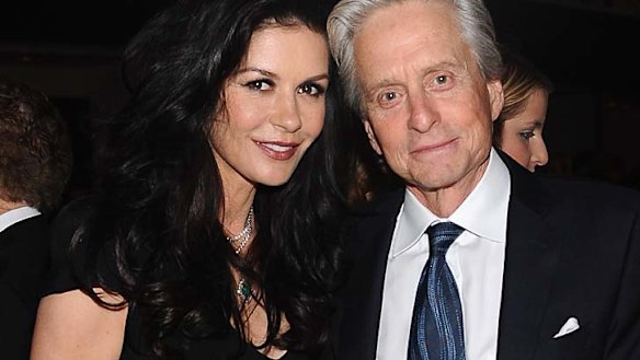 Cured: Michael Douglas with wife, Catherine Zeta Jones earlier this year.