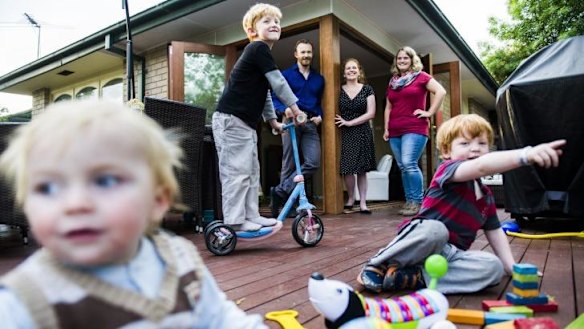 Helping hand:The Hayes family, Brenden, Katherine, Zane, 5, Aiden, 3, and Diesel,1 and with their au pair Larissa Hettich. 