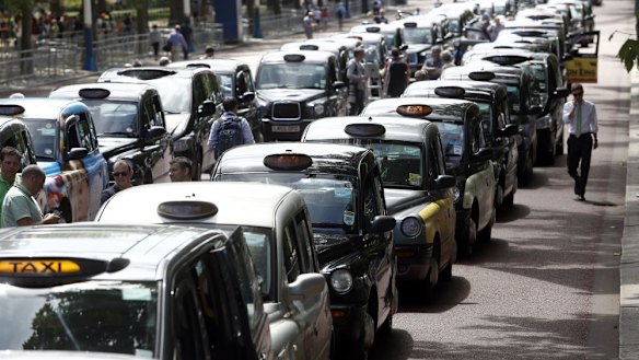 London taxi cabs parked in protest against Uber in 2014.