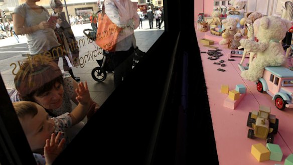 Callum Hill with his grandmother Mary Feeney at the David Jones Christmas window display in Sydney.