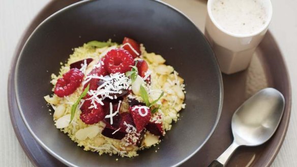 Breakfast cous cous with berries and coconut.